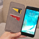 Illustration for article titled Someone Convince Me That an iPhone Wallet Case Isn't the Dumbest Idea in the World